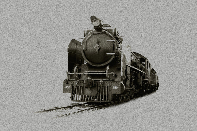A vintage black-and-white steam locomotive moving along empty tracks, its imposing front dominating the scene. The aged, grainy texture adds a haunting, timeless quality, suggesting a connection to Candle Face Chronicles and the notion of a "New Undergrou