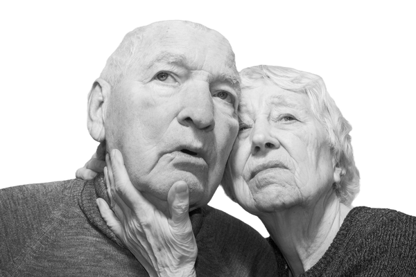 An elderly couple in black and white, their expressions filled with worry and guilt. Represents 'Candle Face Victims 40 and 41: Haunted by Voices, Bound by Guilt,' from Candle Face Chronicles by Branching Plot Books.