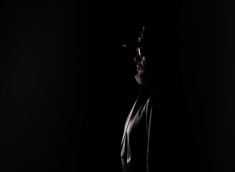 From Shadows to Light: The Elderly Witness to Candle Face's Past