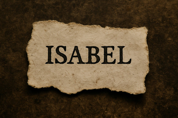 A torn piece of aged parchment with the name Isabel printed in bold black letters, representing the forgotten daughter of La Llorona and the true identity of Candle Face.