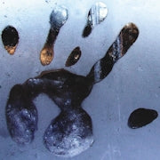 Dark handprint on fogged glass, representing Candle Face’s mark in The Empty Lot Next Door.